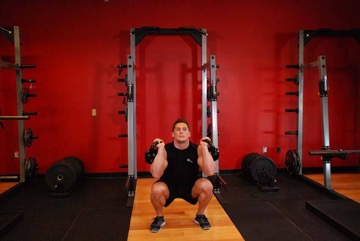 Thruster con kettlebell: posición final