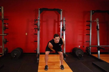 One-Arm Kettlebell Snatch: posición final